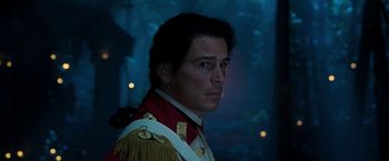 Movie still from “The Lovers” (2015), directed by Roland Joffé – A person wearing a uniform; Close Up shot, Over the shoulder angle