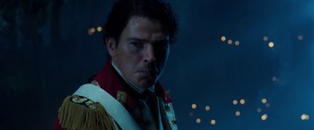 Movie still from “The Lovers” (2015), directed by Roland Joffé – A person wearing a uniform; Close Up shot, Low angle