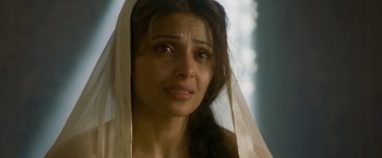 Movie still from “The Lovers” (2015), directed by Roland Joffé – A person wearing a veil; Close Up shot, High angle