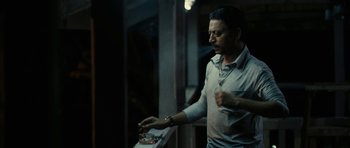 Movie still from “The Lunchbox” (2013), directed by Ritesh Batra – A man standing in front of a window; Close Up shot, High angle
