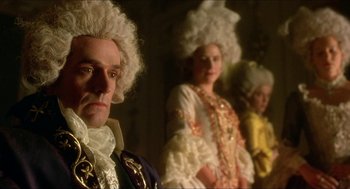 Movie still from “The Madness of King George” (1994), directed by Nicholas Hytner – A man and two women dressed in period costumes; Close Up shot, Low angle