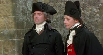 Movie still from “The Madness of King George” (1994), directed by Nicholas Hytner – A couple of men in old - fashioned hats and coats; Medium shot, Low angle