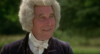 Movie still from “The Madness of King George” (1994), directed by Nicholas Hytner – An older man wearing a white wig and a black jacket; Close Up shot, Low angle