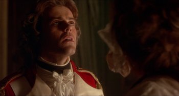 Movie still from “The Madness of King George” (1994), directed by Nicholas Hytner – A person wearing a suit and tie; Close Up shot, Low angle