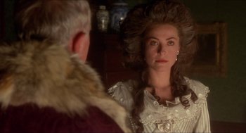 Movie still from “The Madness of King George” (1994), directed by Nicholas Hytner – A woman in a white dress looking into a mirror; Close Up shot, Over the shoulder angle
