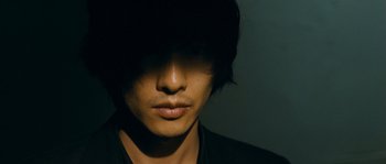 A man's face in the dark