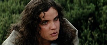 Movie still from “The Man from Snowy River” (1982), directed by George Miller – A person with long hair; Close Up shot, Low angle