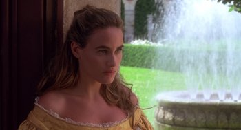 Movie still from “The Man in the Iron Mask” (1998), directed by Randall Wallace – A beautiful young lady looking out a window; Close Up shot, Over the shoulder angle