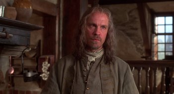 Movie still from “The Man in the Iron Mask” (1998), directed by Randall Wallace – A person with long white hair; Close Up shot, Low angle