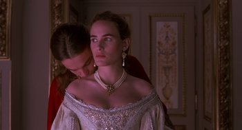 Movie still from “The Man in the Iron Mask” (1998), directed by Randall Wallace – A man and a woman in a room; Medium shot, Low angle