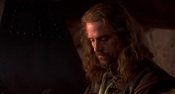Movie still from “The Man in the Iron Mask” (1998), directed by Randall Wallace – A person with long hair; Close Up shot, Over the shoulder angle