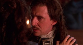 Movie still from “The Man in the Iron Mask” (1998), directed by Randall Wallace – A person with a mustache; Close Up shot, Over the shoulder angle