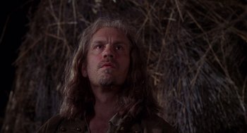 Movie still from “The Man in the Iron Mask” (1998), directed by Randall Wallace – A person with long hair; Close Up shot, Low angle