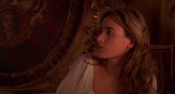 Movie still from “The Man in the Iron Mask” (1998), directed by Randall Wallace – A beautiful young lady sitting in front of a mirror; Close Up shot, Over the shoulder angle