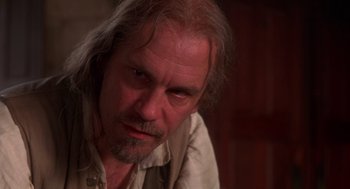 Movie still from “The Man in the Iron Mask” (1998), directed by Randall Wallace – A person with long white hair; Close Up shot, Low angle