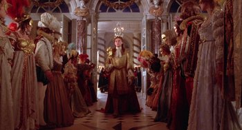 Movie still from “The Man in the Iron Mask” (1998), directed by Randall Wallace – A group of people dressed up in fancy costumes; Wide shot, Low angle