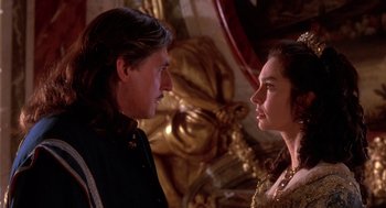 Movie still from “The Man in the Iron Mask” (1998), directed by Randall Wallace – A man and a woman standing next to each other; Close Up shot, Over the shoulder angle