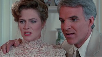 Movie still from “The Man with Two Brains” (1983), directed by Carl Reiner – A man and a woman are looking at each other; Close Up shot, Over the shoulder angle