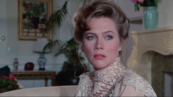 Movie still from “The Man with Two Brains” (1983), directed by Carl Reiner – A person wearing a dress; Close Up shot, Over the shoulder angle