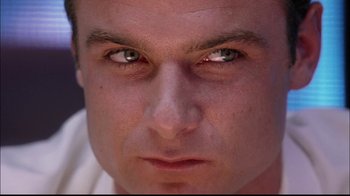 Movie still from “The Manchurian Candidate” (2004), directed by Jonathan Demme – A man's face with a serious look on his face; Extreme Close Up shot, Low angle
