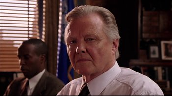 Movie still from “The Manchurian Candidate” (2004), directed by Jonathan Demme – An older man in a white dress shirt and tie; Close Up shot, Low angle