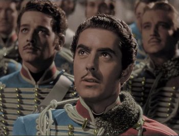 Movie still from “The Mark of Zorro” (1940), directed by Rouben Mamoulian – A group of men in uniforms are standing in a row; Close Up shot, Low angle