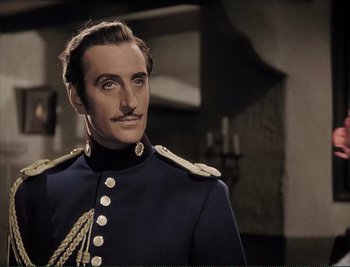 Movie still from “The Mark of Zorro” (1940), directed by Rouben Mamoulian – A person wearing a uniform; Close Up shot, Over the shoulder angle