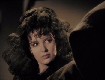 Movie still from “The Mark of Zorro” (1940), directed by Rouben Mamoulian – A person wearing a hat; Close Up shot, Over the shoulder angle