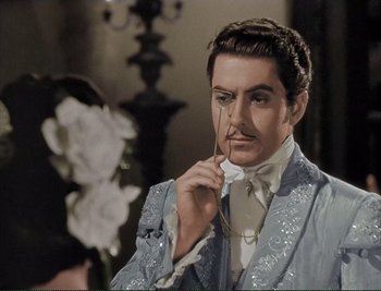 Movie still from “The Mark of Zorro” (1940), directed by Rouben Mamoulian – A man that is wearing a suit and tie; Medium shot, High angle