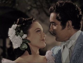 Movie still from “The Mark of Zorro” (1940), directed by Rouben Mamoulian – A man and a woman are looking into each others eyes; Close Up shot, Low angle