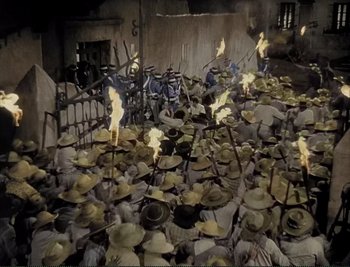 Movie still from “The Mark of Zorro” (1940), directed by Rouben Mamoulian – A room filled with lots of hats on top of each other; Extreme Wide shot, High angle