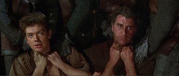 Movie still from “The Masque of the Red Death” (1964), directed by Roger Corman – A person with a beard; Close Up shot, High angle