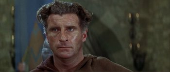 Movie still from “The Masque of the Red Death” (1964), directed by Roger Corman – An older man is looking into the distance; Close Up shot, Low angle