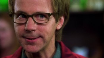 Movie still from “The Master of Disguise” (2002), directed by Perry Andelin Blake – A person wearing glasses; Close Up shot, Over the shoulder angle