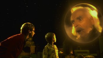 Movie still from “The Master of Disguise” (2002), directed by Perry Andelin Blake – A man and a boy looking into a mirror at night; Close Up shot, Over the shoulder angle