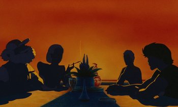 Movie still from “The Masters of Time” (1982), directed by René Laloux – Three people sitting at a table with a plant in the middle of the table; Extreme Wide shot, Low angle