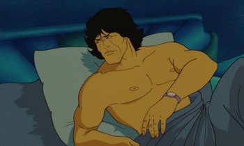 Movie still from “The Masters of Time” (1982), directed by René Laloux – A man laying on top of a bed with his hand on his stomach; Close Up shot, Low angle