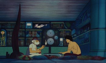 Movie still from “The Masters of Time” (1982), directed by René Laloux – Two people sitting in a room with a bookshelf in the background; Wide shot, Overhead angle