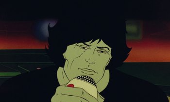 Movie still from “The Masters of Time” (1982), directed by René Laloux – An animated picture of a man holding a microphone; Close Up shot, Low angle