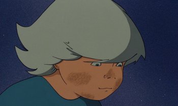 Movie still from “The Masters of Time” (1982), directed by René Laloux – A person's face in a cartoon style; Close Up shot, High angle