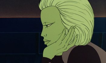 Movie still from “The Masters of Time” (1982), directed by René Laloux – A cartoon of a woman's face with her hand on her ear; Close Up shot, Low angle