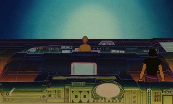 Movie still from “The Masters of Time” (1982), directed by René Laloux – An image of a man sitting in front of a television set; Extreme Wide shot, Overhead angle