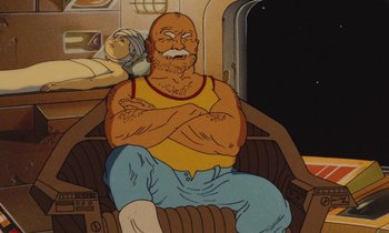 Movie still from “The Masters of Time” (1982), directed by René Laloux – An old man sitting in a chair with his arms crossed; Medium shot, Low angle