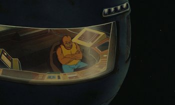 Movie still from “The Masters of Time” (1982), directed by René Laloux – Picture of a man sitting in a space helmet; Medium shot, High angle