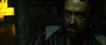 Movie still from “The Mexican” (2001), directed by Gore Verbinski – A person wearing a leather jacket; Close Up shot, Over the shoulder angle