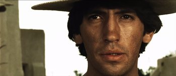 Movie still from “The Mexican” (2001), directed by Gore Verbinski – A person wearing a hat; Close Up shot, Low angle