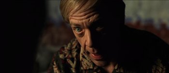 Movie still from “The Mexican” (2001), directed by Gore Verbinski – A person with his eyes wide open; Close Up shot, Low angle