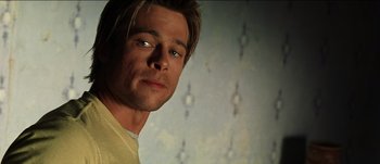 Movie still from “The Mexican” (2001), directed by Gore Verbinski – A person wearing a yellow t - shirt; Close Up shot, Low angle