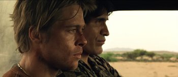 Movie still from “The Mexican” (2001), directed by Gore Verbinski – Two men are sitting side by side in a vehicle; Close Up shot, Low angle