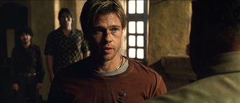 Movie still from “The Mexican” (2001), directed by Gore Verbinski – A person wearing a t - shirt; Close Up shot, Over the shoulder angle